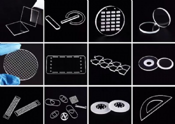 Laser processing of glass sheets